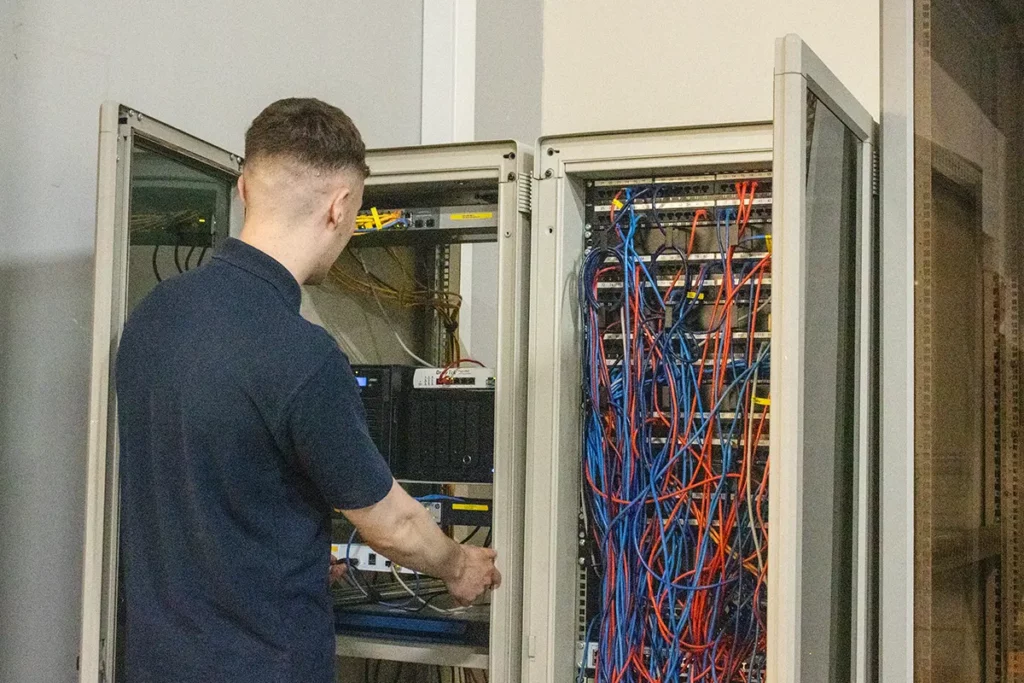 MT Service employee Installing IT infrastructure